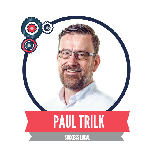 A smiling man with glasses and short hair is featured in a circular frame, accompanied by decorative gears. Below his image, the name "Paul Trilk" is prominently displayed, along with the phrase "Success Local."