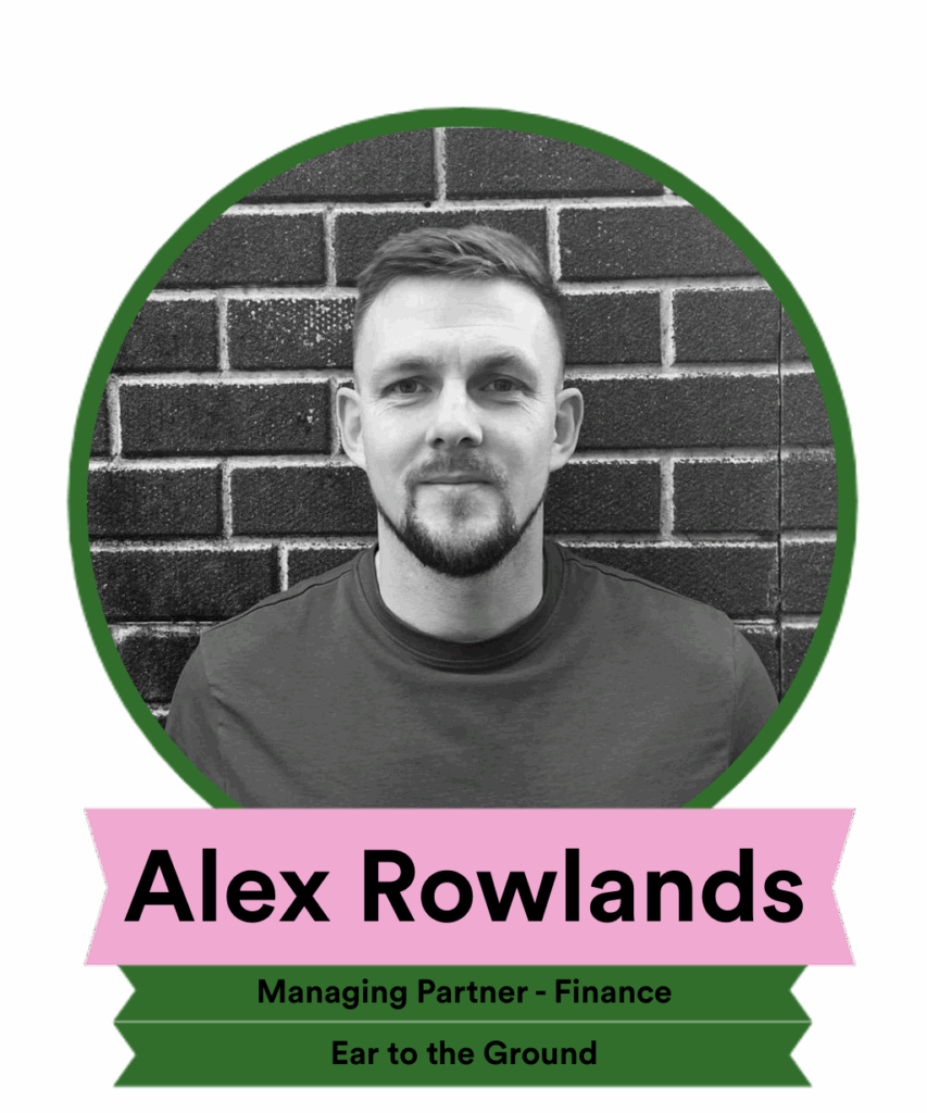 Black and white portrait of a man named Alex Rowlands, identified as Managing Partner - Finance at Ear to the Ground, set against a brick background. The image features a circular frame with a green border and a pink banner at the bottom.