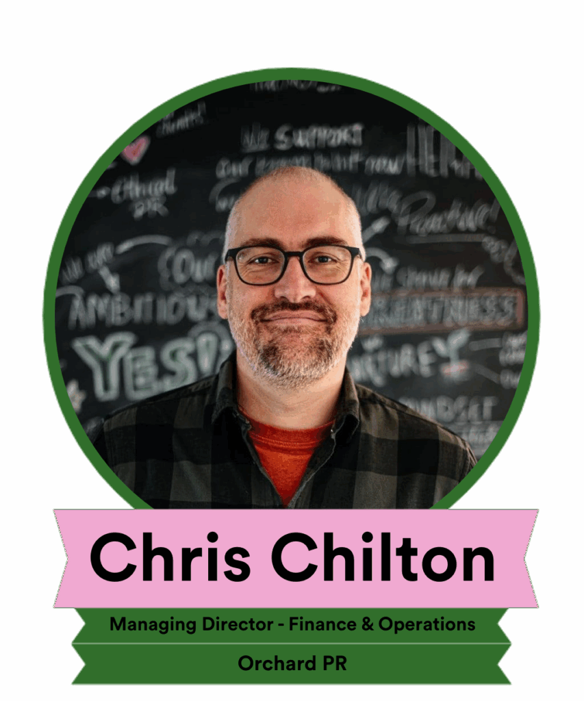 A portrait of Chris Chilton, a man with glasses and a beard, smiling in front of a chalkboard background with various writings. The image includes a name banner identifying him as Managing Director of Finance & Operations at Orchard PR.