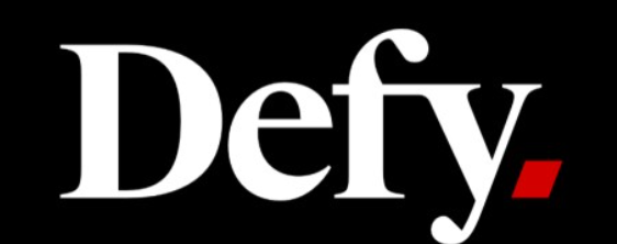 White "Defy." text with a red period on a black background.